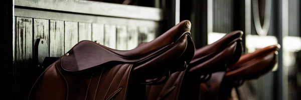 Butet saddles on a beautiful saddle rack.