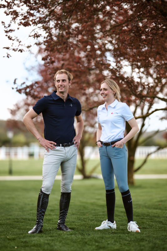Two riders modeling breeches.