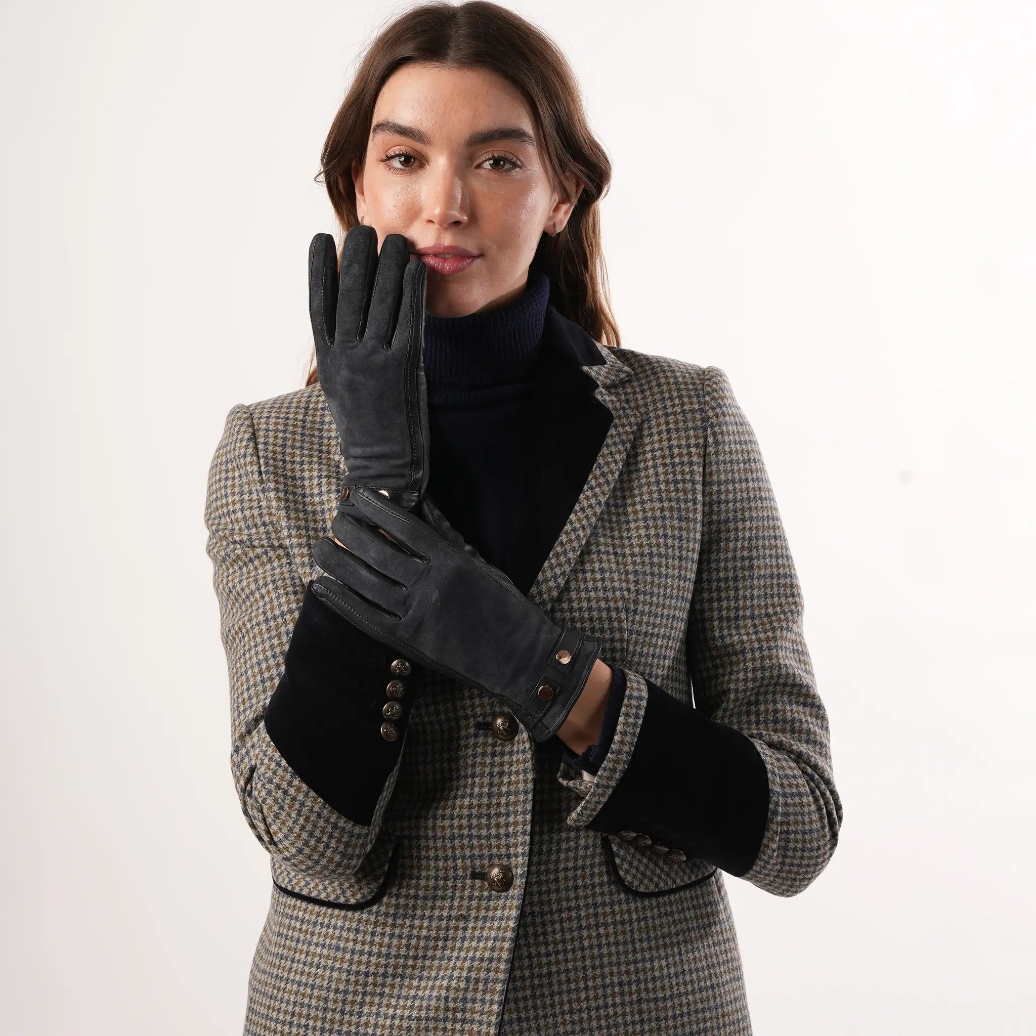 Grantham Midnight Check Wool Jacket by Welligogs, close-up on a model showing the check pattern, velvet lapels, and buttoned contrast cuffs.