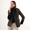 Grantham Sage Check Wool Jacket by Welligogs, front studio view on a model showing flap pockets and buttons on the contrast cuffs.