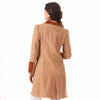 A woman shown from the back wearing the Welligogs Damelza Camel Coat - a camel-colored textured coat with contrasting brown collar and cuff details, set against a plain white background.