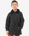 Child wearing a black quilted jacket on a white background