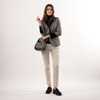Grantham Midnight Check Wool Jacket by Welligogs, full-length front studio view on a model with one arm raised to show the contrast cuff.