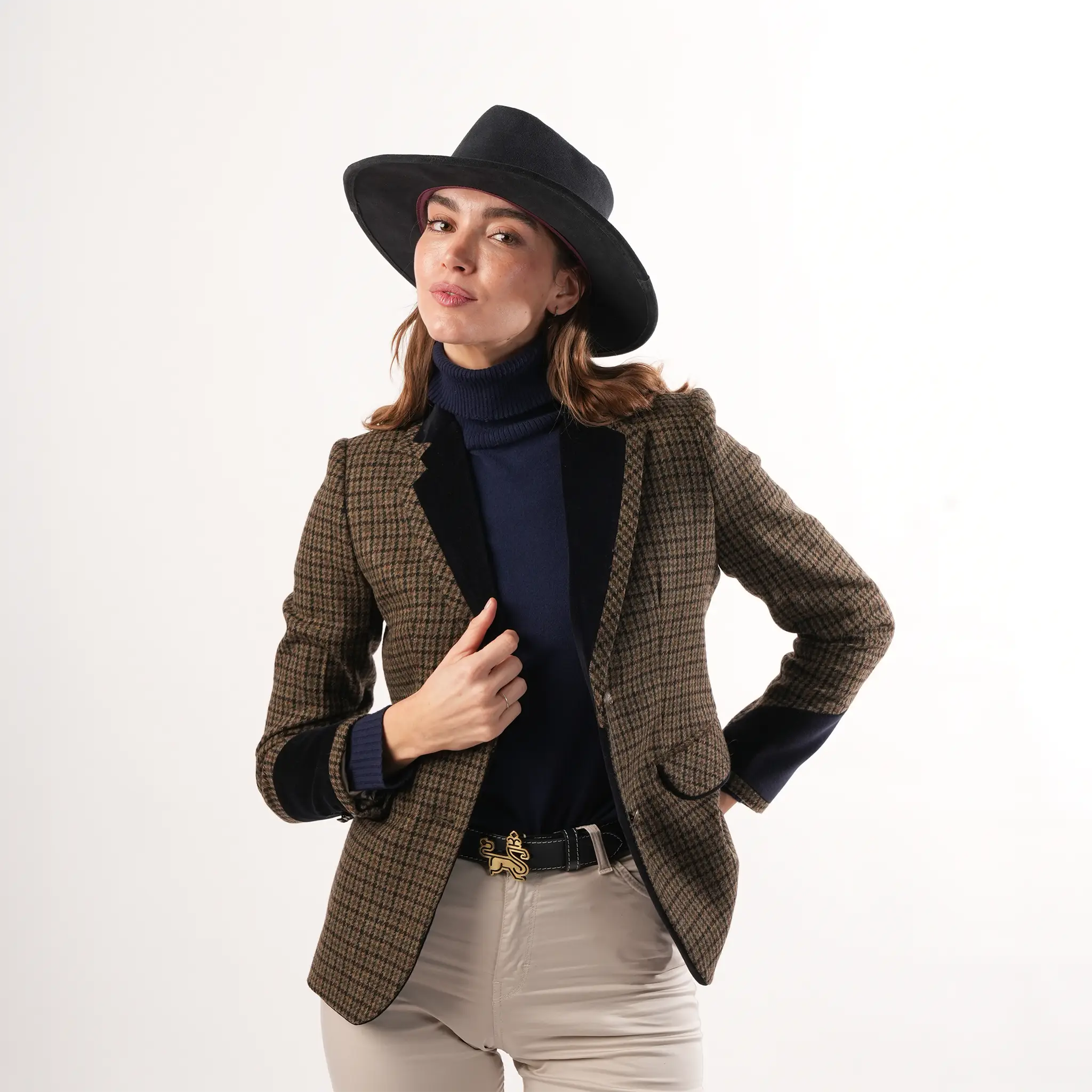 Grantham Sage Check Wool Jacket by Welligogs, studio view on a model wearing a hat, showing the open front and contrast navy trim.