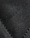 A close-up texture shot of a dark gray fabric, showing a fine woven pattern and a diagonal stitched seam.