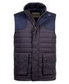 A Barbour quilted puffer vest in dark navy with contrasting textured navy shoulder panels and a high collar, shown against a plain white background.