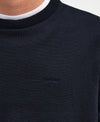 Navy sweater with Barbour logo on a white background