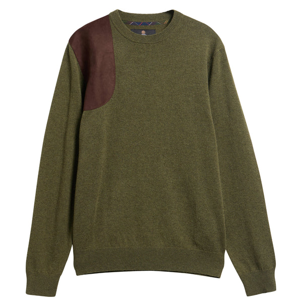 An olive green crewneck sweater with a contrasting dark brown suede patch on the right shoulder, displayed against a solid white background.
