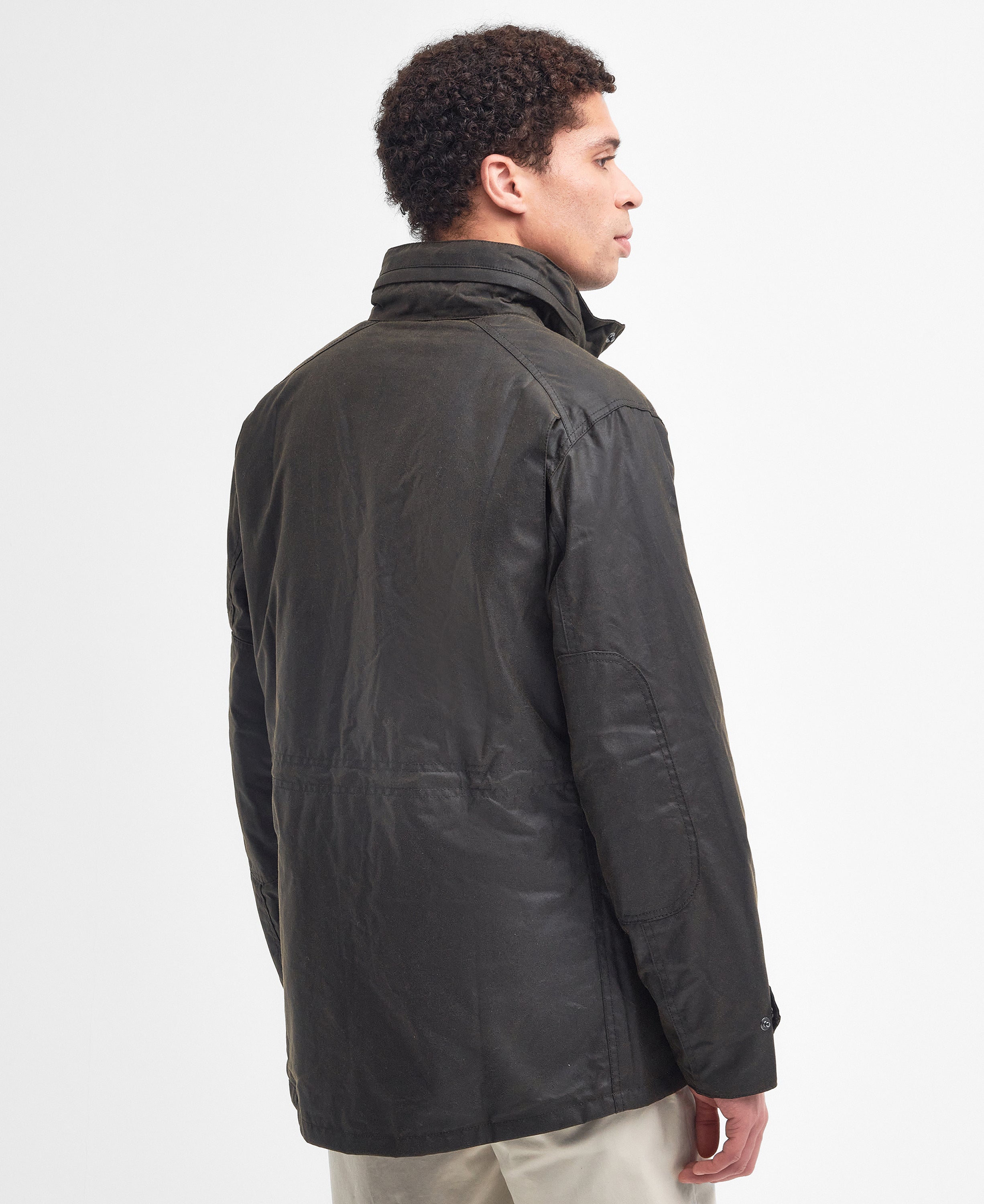 Model wearing the Barbour Sapper Wax Jacket, showing the back and collar detail.