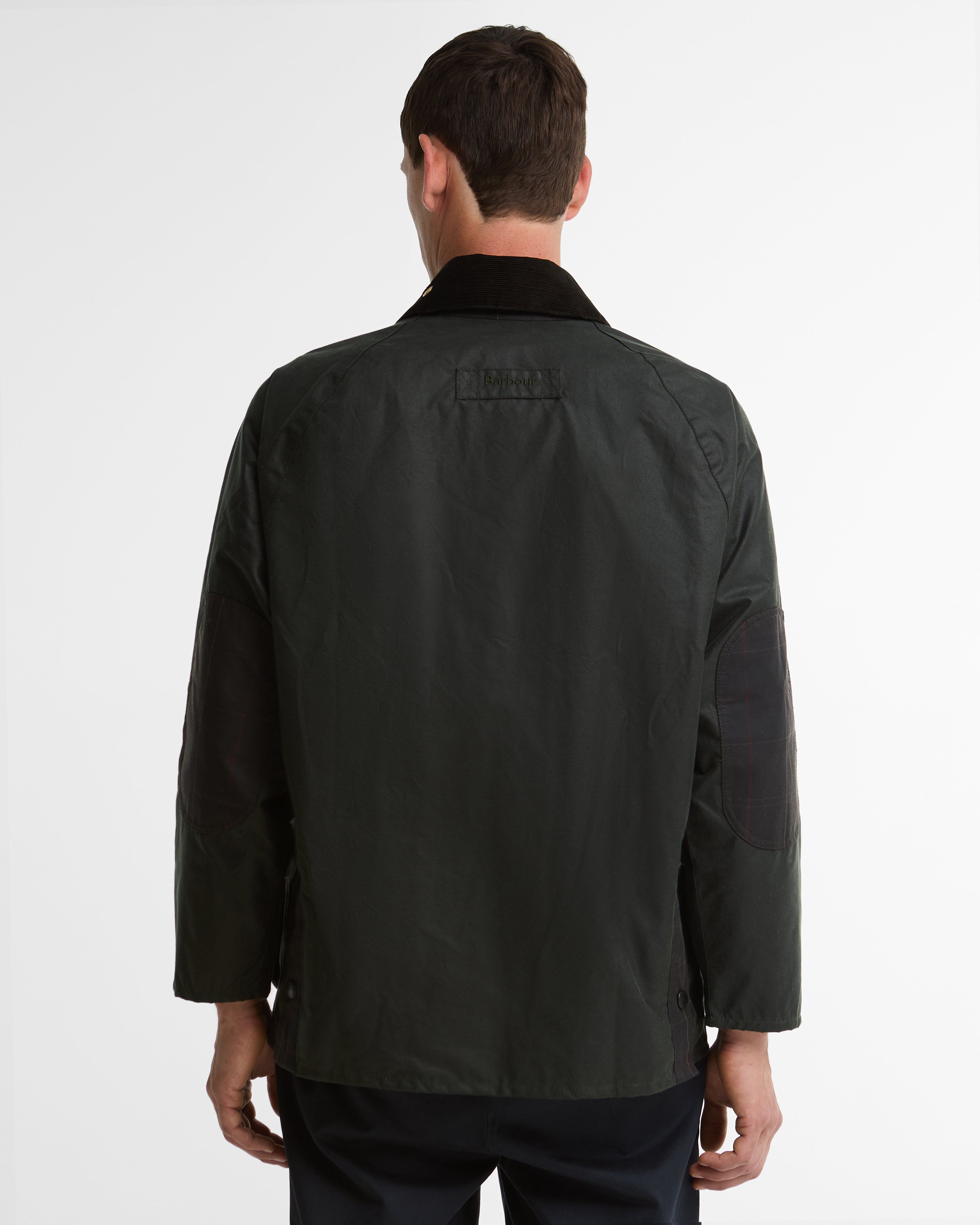 Rear view of the Barbour Icons Patch Bedale Wax Jacket in sage green waxed cotton, showing the corduroy collar and Barbour back patch.