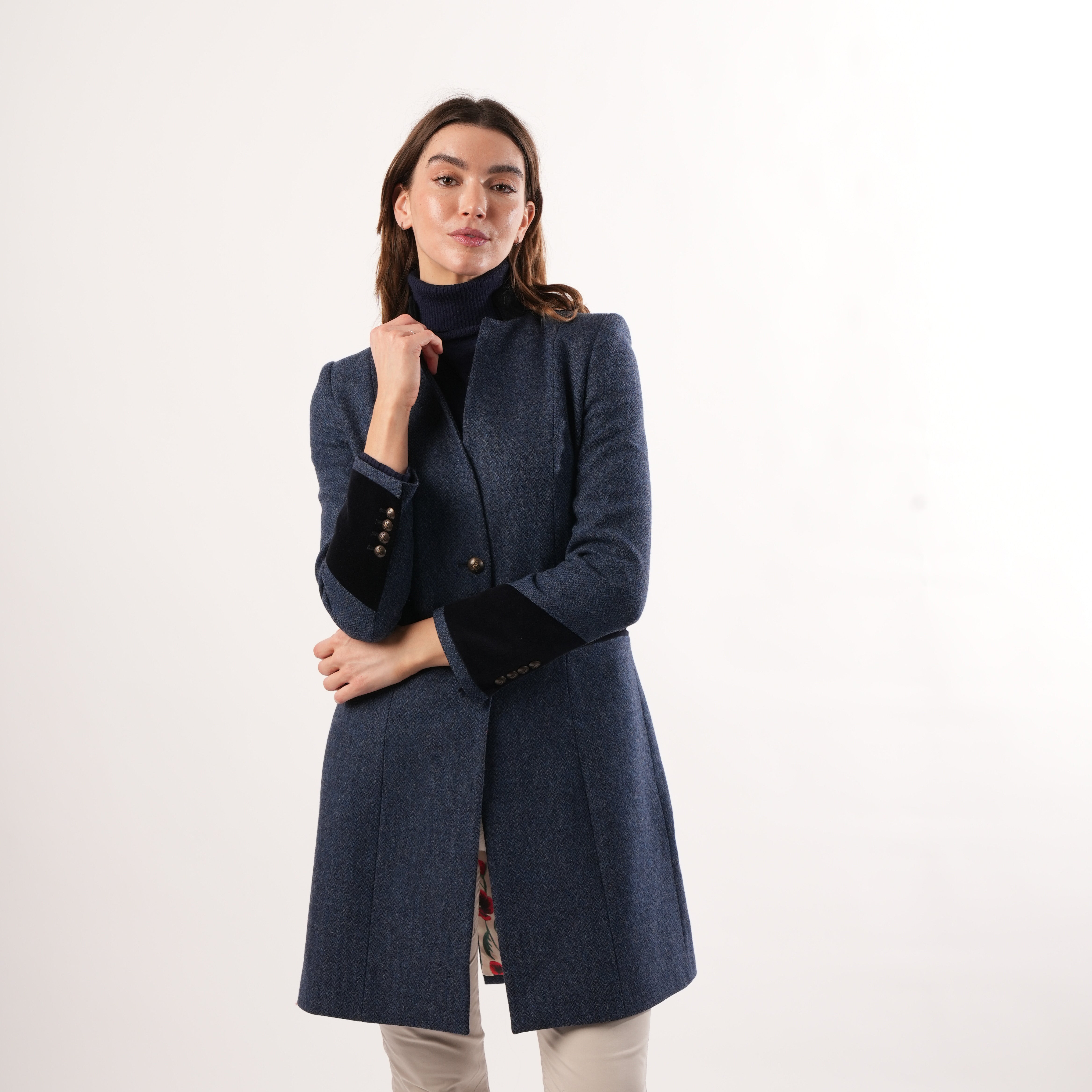 Oxford Navy Coat by Welligogs, studio front view showing button details and contrast cuffs.
