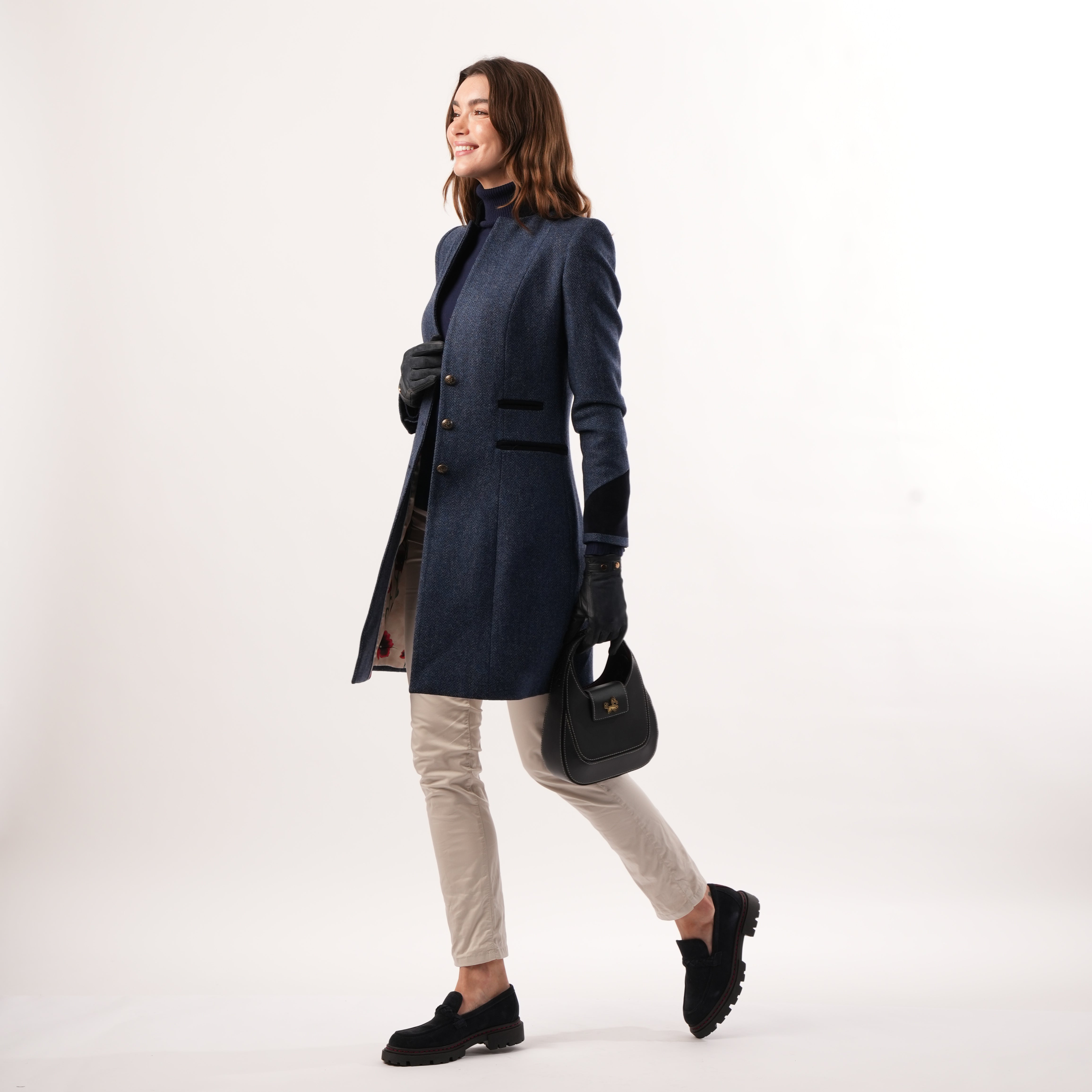 Oxford Navy Coat by Welligogs, full-length three-quarter view showing the longline silhouette.