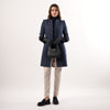 Oxford Navy Coat by Welligogs, full-length front view showing the tailored waist and contrast cuffs.