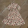 Floral dress on a stone floor