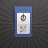 pinsnickety charm back, showing black split ring and qr code